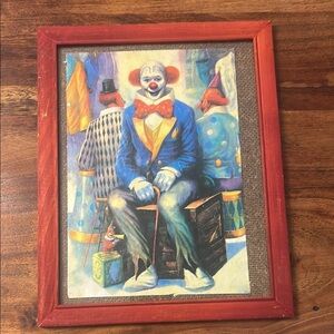 Vibrant Clown Painting in Red Frame